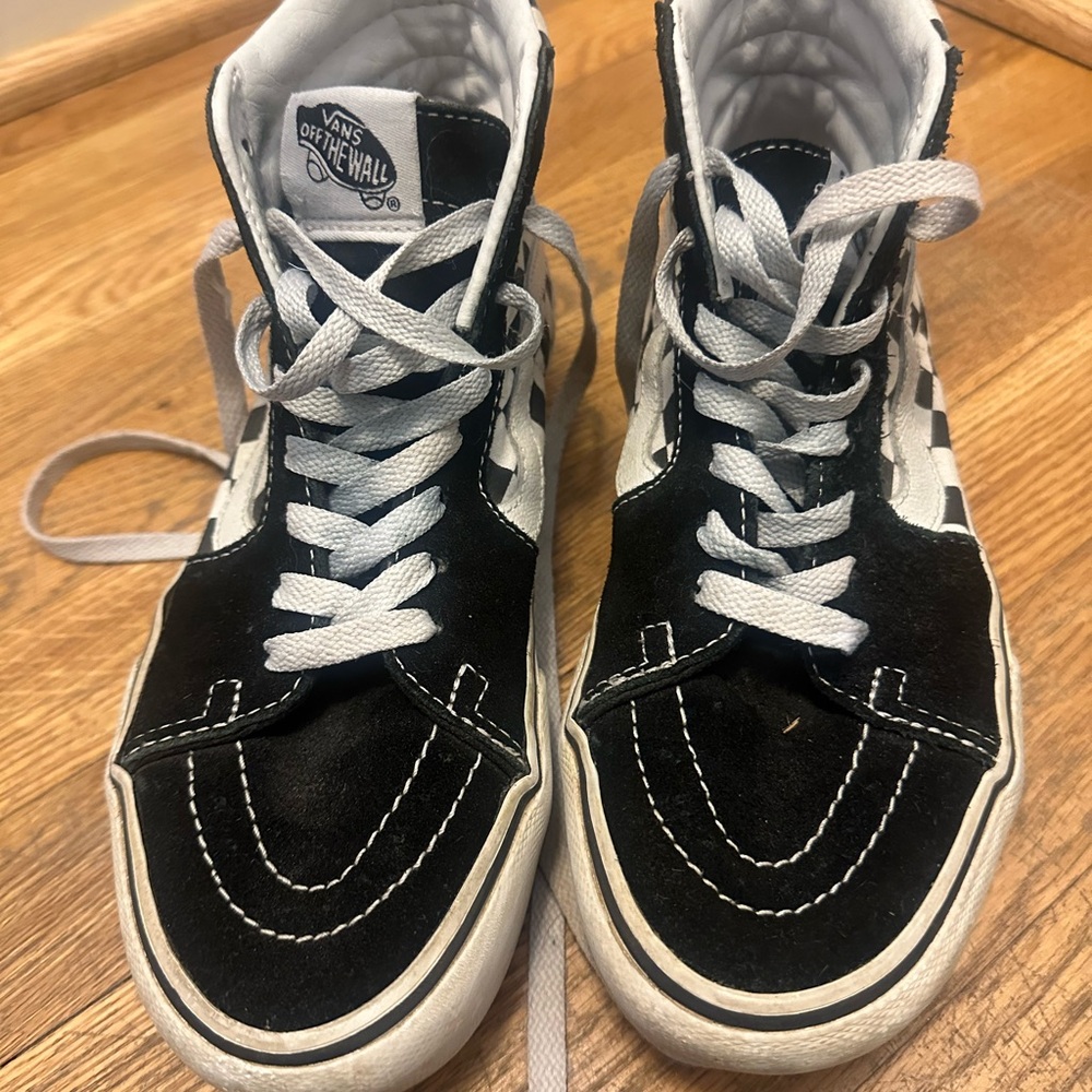 Vans Black and White High-Top Sneakers with Signature Stripe
